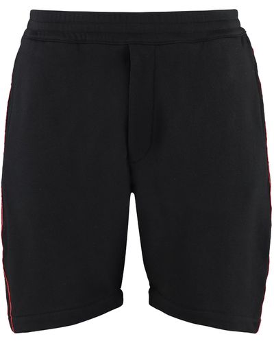 Alexander McQueen Shorts con bande laterali logate - Nero