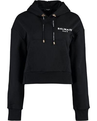 Balmain FELPA CROPPED CON STAMPA LOGO FLOCCATA - Nero