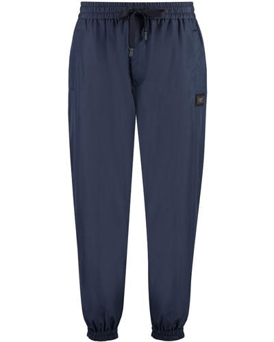 Dolce & Gabbana Track-pants in nylon con logo - Blu