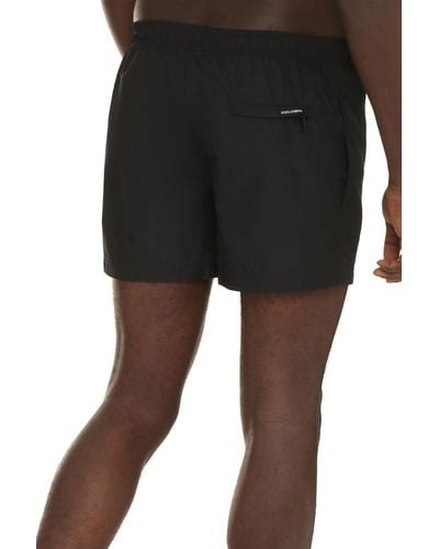 Dolce & Gabbana Shorts da mare con logo - Nero