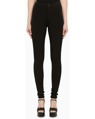 Saint Laurent Pantalone attillato in jersey - Nero