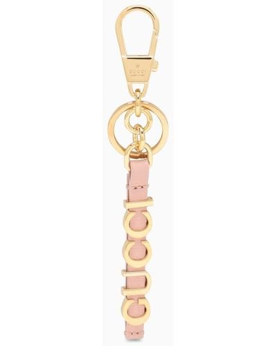 Gucci Portachiavi rosa e oro in pelle con logo - Metallizzato