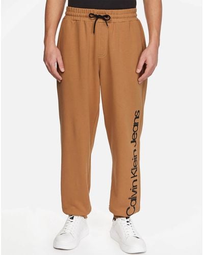 Calvin Klein Logo-printed Cotton Trousers - Brown