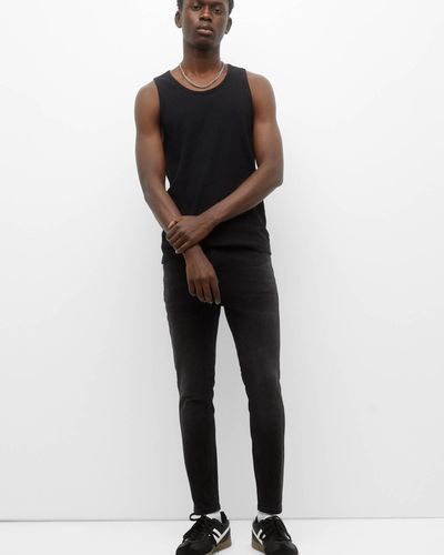 Pull&Bear Black Carrot Fit Jeans With A Faded Finish