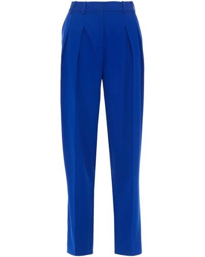 Victoria Beckham Pleated Crepe Tapered Pants - Blue