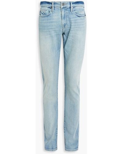 FRAME L'homme jeans mit schmalem bein aus denim in ausgewaschener optik - Blau