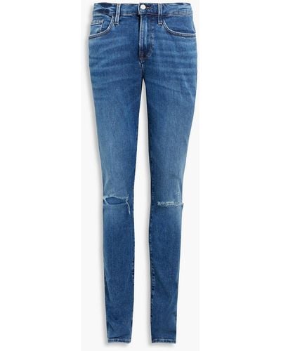 FRAME L'homme Skinny-fit Distressed Faded Denim Jeans - Blue