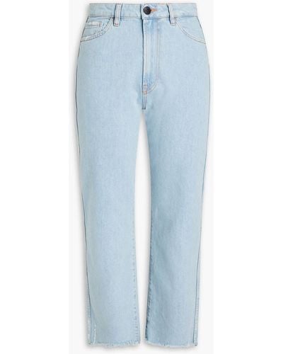 3x1 Emma hoch sitzende kick-flare-jeans in ausgewaschener optik mit fransen - Blau