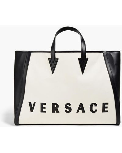 Versace Logo-appliquéd Leather And Cotton-canvas Tote - Black