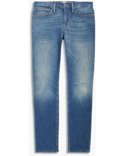 FRAME Skinny-fit Faded Distressed Denim Jeans - Blue