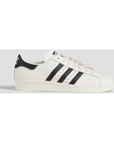 adidas Originals Superstar 82 Striped Leather Sneakers - White