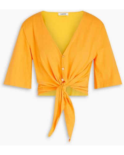 Sandro Knotted Button-embellished Cotton-jersey Top - Yellow