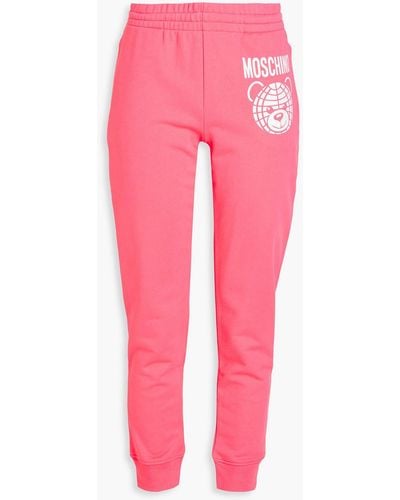 Moschino Track pants aus baumwollfrottee mit print - Pink