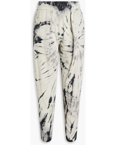 Raquel Allegra Cropped Pleated Tie-dyed Cotton-jersey Tapered Trousers - White