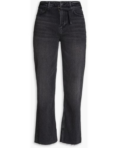 PAIGE Halbhohe bootcut-jeans in ausgewaschener optik - Schwarz