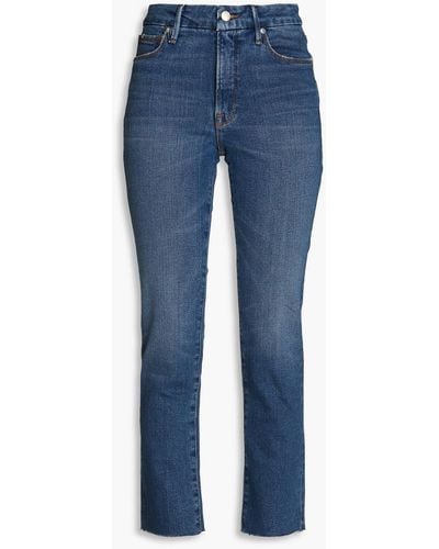 GOOD AMERICAN Halbhohe jeans mit schmalem bein in ausgewaschener optik - Blau