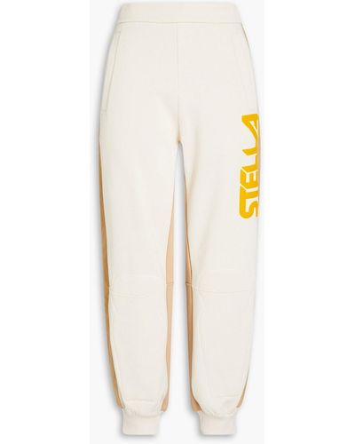 Stella McCartney Track pants aus beflocktem baumwollfleece mit shell-einsatz - Weiß
