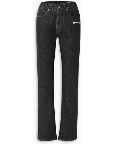 Stella McCartney Hoch sitzende jeans mit geradem bein und print - Schwarz
