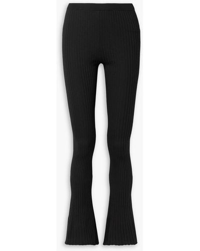 Gauchère Ribbed Wool Flared Trousers - Black