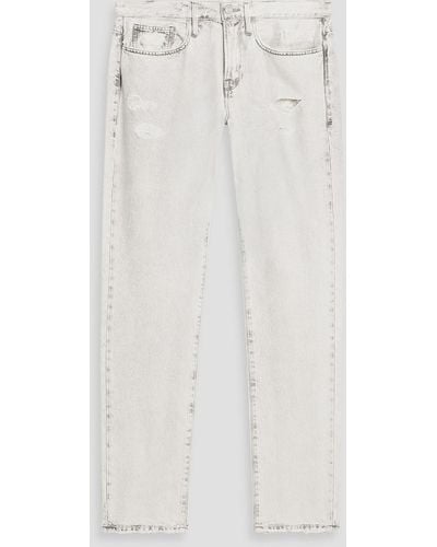 FRAME L'homme jeans mit schmalem bein aus denim in distressed-optik - Weiß