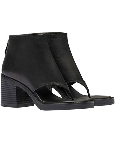 Miu Miu Flip-Flop-Stiefel mit Blockabsatz aus Leder - Schwarz