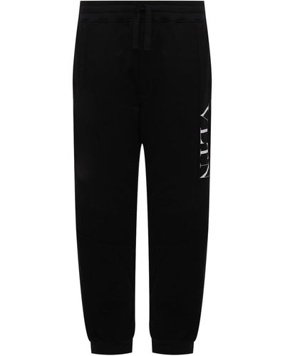 Valentino Pantaloni in cotone con logo - Nero