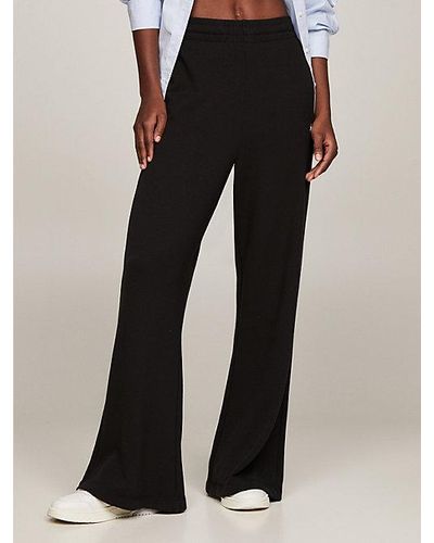 Tommy Hilfiger Pantalón de chándal amplio con parche de Tommy - Negro