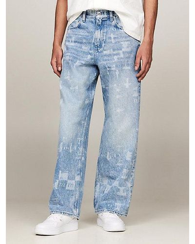 Tommy Hilfiger Genderneutrale Jeans mit weitem Bein und gelasertem Print - Blau