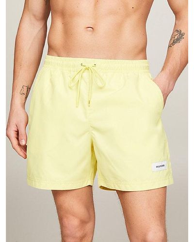 Tommy Hilfiger Hilfiger Monotype mittellange Badeshorts - Gelb