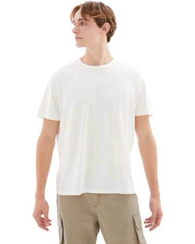 T-shirt Blanc avec poche en noir et dorée – Legacy-Outfitters