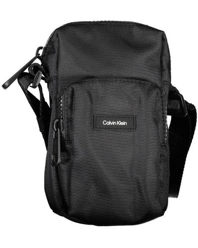 Calvin Klein Elegant Shoulder Bag With Chic Detailing - Black