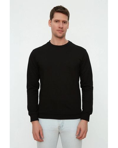 Trendyol Es basic-sweatshirt mit normalem/normalem schnitt und rundhalsausschnitt mit langen ärmeln - Schwarz