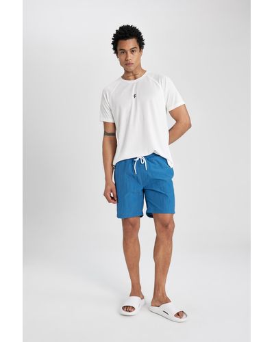 Defacto Fit bedruckte, kurze badeshorts mit normaler passform - Blau