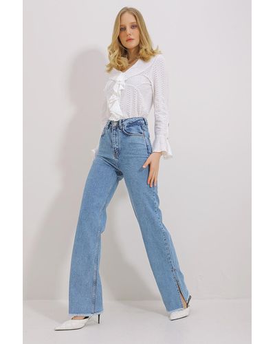 Trend Alaçatı Stili E jeanshose mit hoher taille und seitlichem schlitz und weitem bein - Blau