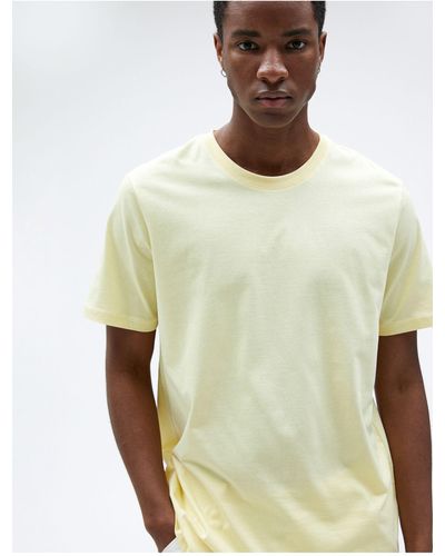 Koton Basic-t-shirt mit rundhalsausschnitt und kurzen ärmeln aus baumwolle - Gelb