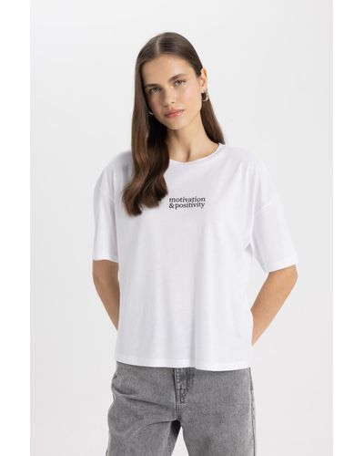 Defacto Bedrucktes t-shirt mit rundhalsausschnitt und kurzen ärmeln im relaxed fit c7722ax24sm - Weiß