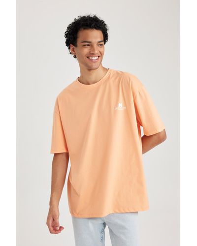 Defacto Bedrucktes kurzarm-t-shirt mit rundhalsausschnitt in oversize-passform b3785ax23hs - Orange