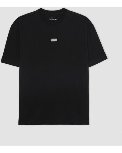 Defacto Passform: oversize-fit-kurzarm-t-shirt mit rundhalsausschnitt b4513ax24sp - Schwarz