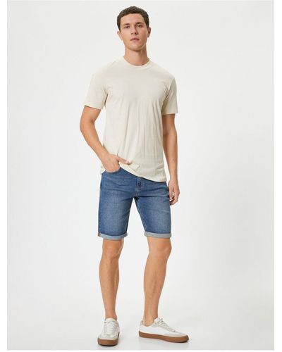 Koton Layered leg bermuda jeans shorts mit taschen und knöpfen - Blau