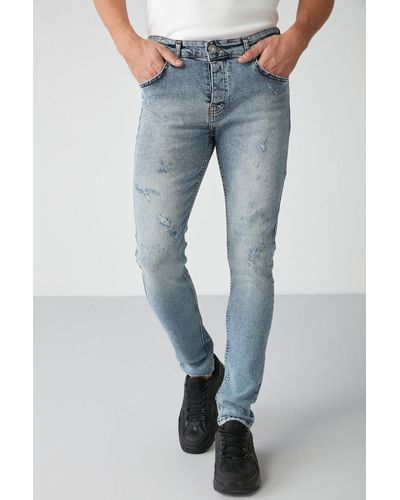 Grimelange Johen jeans mit ausgefranstem skinny-fit, dicker struktur, flexibel, hellblau