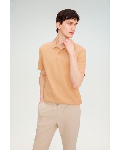 Defacto Kurzärmliges polo-t-shirt mit normaler passform b4939ax24sp - Orange