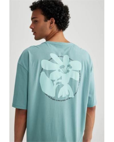 Defacto Oversize-fit-kurzarm-t-shirt mit rundhalsausschnitt und rückendruck b3786ax23hs - Blau