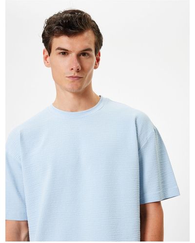 Koton Kurzärmliges oversize-t-shirt aus strukturierter baumwolle mit rundhalsausschnitt - Blau