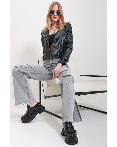 Trend Alaçatı Stili E jeanshose im used-look mit hoher taille und seitenschlitz - Grau