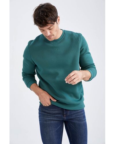 Defacto Basic-sweatshirt aus baumwolle mit normaler passform und rundhalsausschnitt - Grün