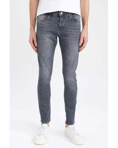 Defacto Carlo skinny fit jeans mit normaler taille und extra schmalem bein a2140ax23sp - Blau