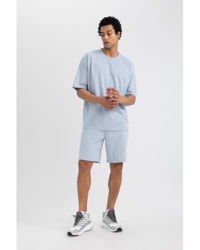 Defacto Fit slim fit shorts mit kurzem bein - Blau