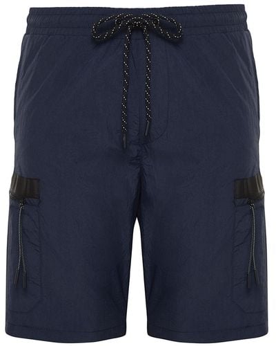 Trendyol Marineblaue shorts mit reißverschluss und detailliertem design in normaler passform