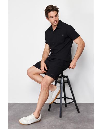 Trendyol Es, normal/normal geschnittenes polo-neck-label-t-shirt-shorts-trainingsanzug-set - Schwarz