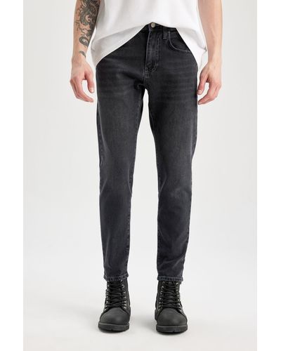 Defacto Slim tapered fit skinny fit jeanshose mit normaler leibhöhe und schrumpfbarem bein b7780ax24sp - Blau